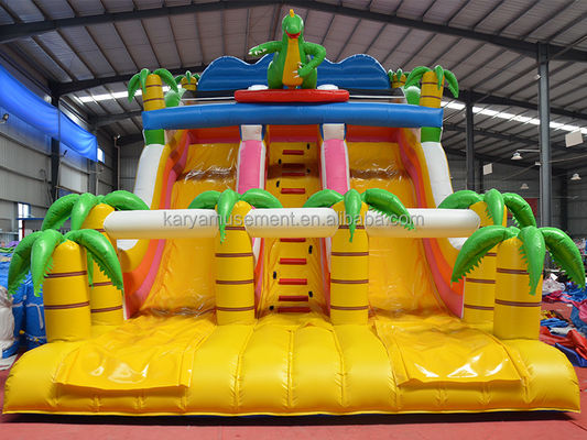 Outdoor Park Game 2-Lane Tropische Palm PVC opblaasbare Dinosaurus Spring Bounce Slide