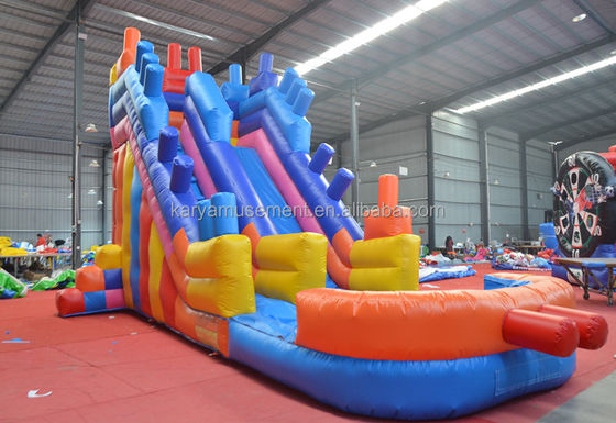 2023 Op maat gemaakte luchtopblaasbare toestellen voor buiten PVC kleurrijke bouwstenen Air Jumping Slide