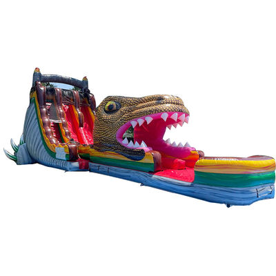Op maat gemaakte PVC opblaasbare springglijbaan Jurassic Dinosaurus thema Waterglijbaan met zwembad