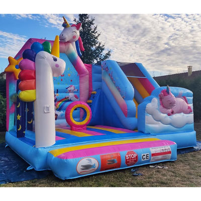 Commerciële PVC Kids Trampoline Games Regenboog Eenhoorn Opblaasbare Leuke Stad Met Glijbaan