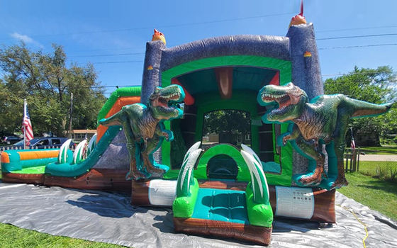 Jurassic Dinosaurs Commercieel PVC opblaasbaar springhuis met glijbaan met blazer