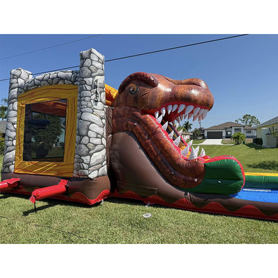 Partijverhuur moet-hebben aanpassen geaccepteerd Jurassic Dinosaur thema Commercieel PVC opblaasbaar springhuis met glijbaan