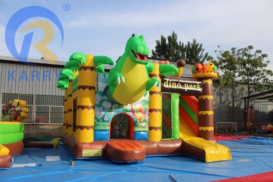 Functies PORTABLE Kinderfestival Springend springkasteel met glijbaan in dinosaurus thema
