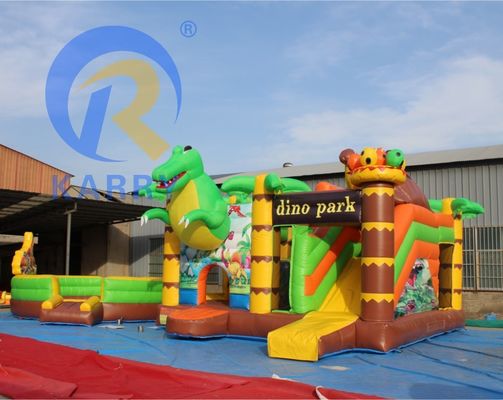 Functies PORTABLE Kinderfestival Springend springkasteel met glijbaan in dinosaurus thema
