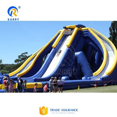 Stimulerende opblaasbare waterslider voor volwassenen en kinderen Grote commerciële springglijbaan
