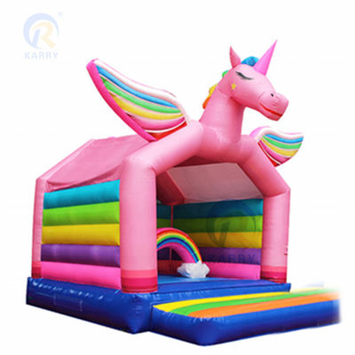 Commerciële regenboogvlekte eenhoorn opblaasbare springkasteel combo slide OEM aanvaardbaar