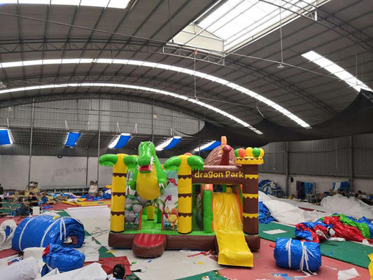 Commercieel bouncy huis pvc opblaasbare bouncer kasteel combo glijbaan in jungle dino park