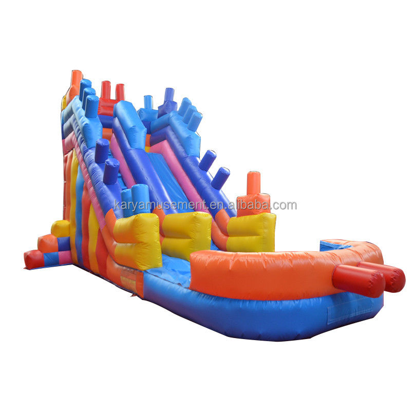2023 Op maat gemaakte luchtopblaasbare toestellen voor buiten PVC kleurrijke bouwstenen Air Jumping Slide