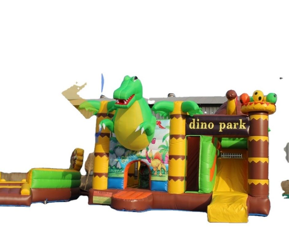 Functies PORTABLE Kinderfestival Springend springkasteel met glijbaan in dinosaurus thema
